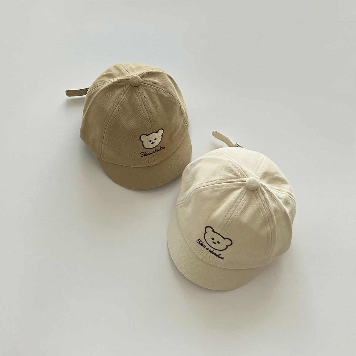 Khaki and beige bear embroidered cotton baby caps