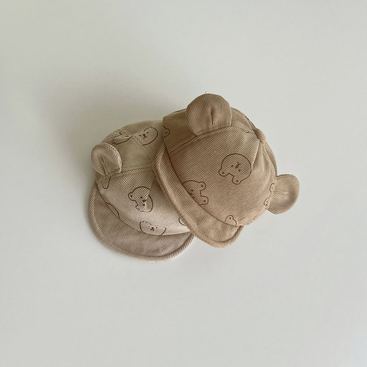 Two bear ear corduroy baby caps