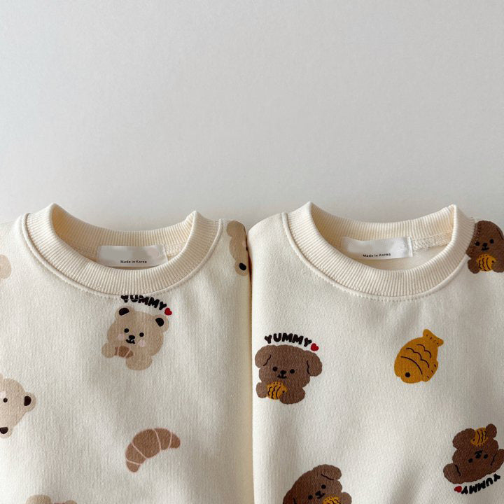 Close-up of the two bear print sweatshirt designs