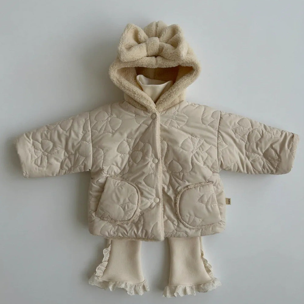 Beige bow hood jacket styled with ruffle leggings