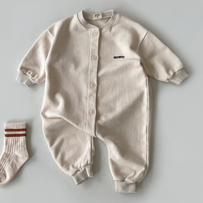 Beige long sleeve button-front baby jumpsuit with ribbed cuffs