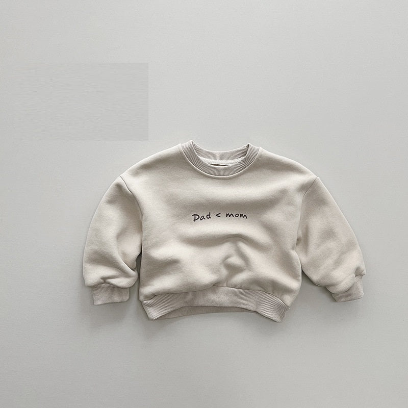 Beige toddler sweatshirt with Dad < Mom slogan