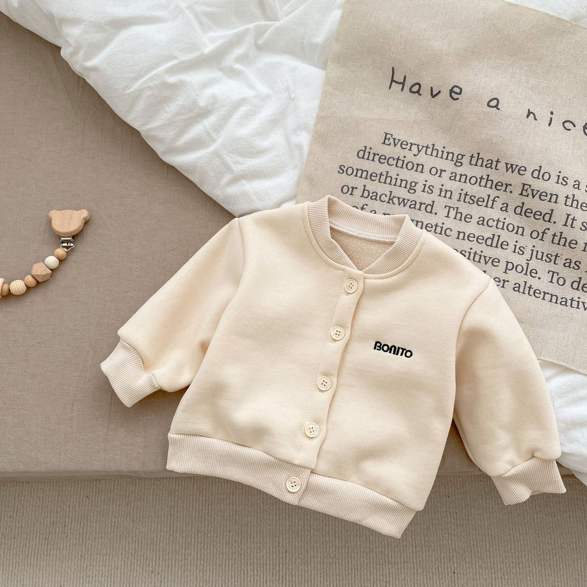 Beige fleece-lined button baby jacket