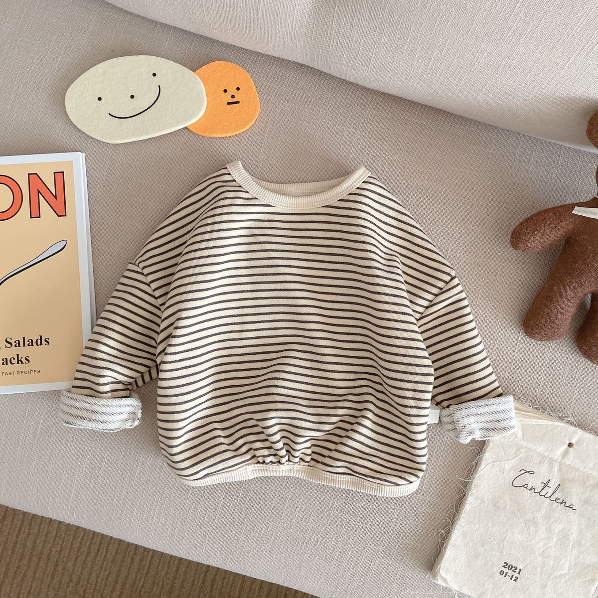 Beige and black striped round neck baby sweatshirt