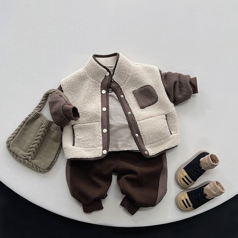 Beige teddy fleece colour-block jacket styled with brown trousers