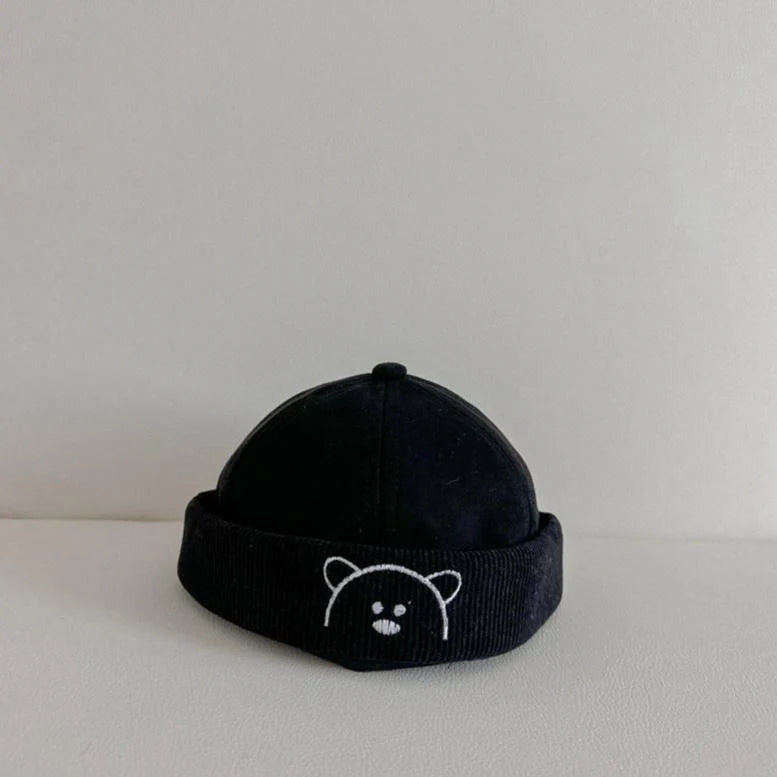 Black corduroy brimless baby hat with bear embroidery