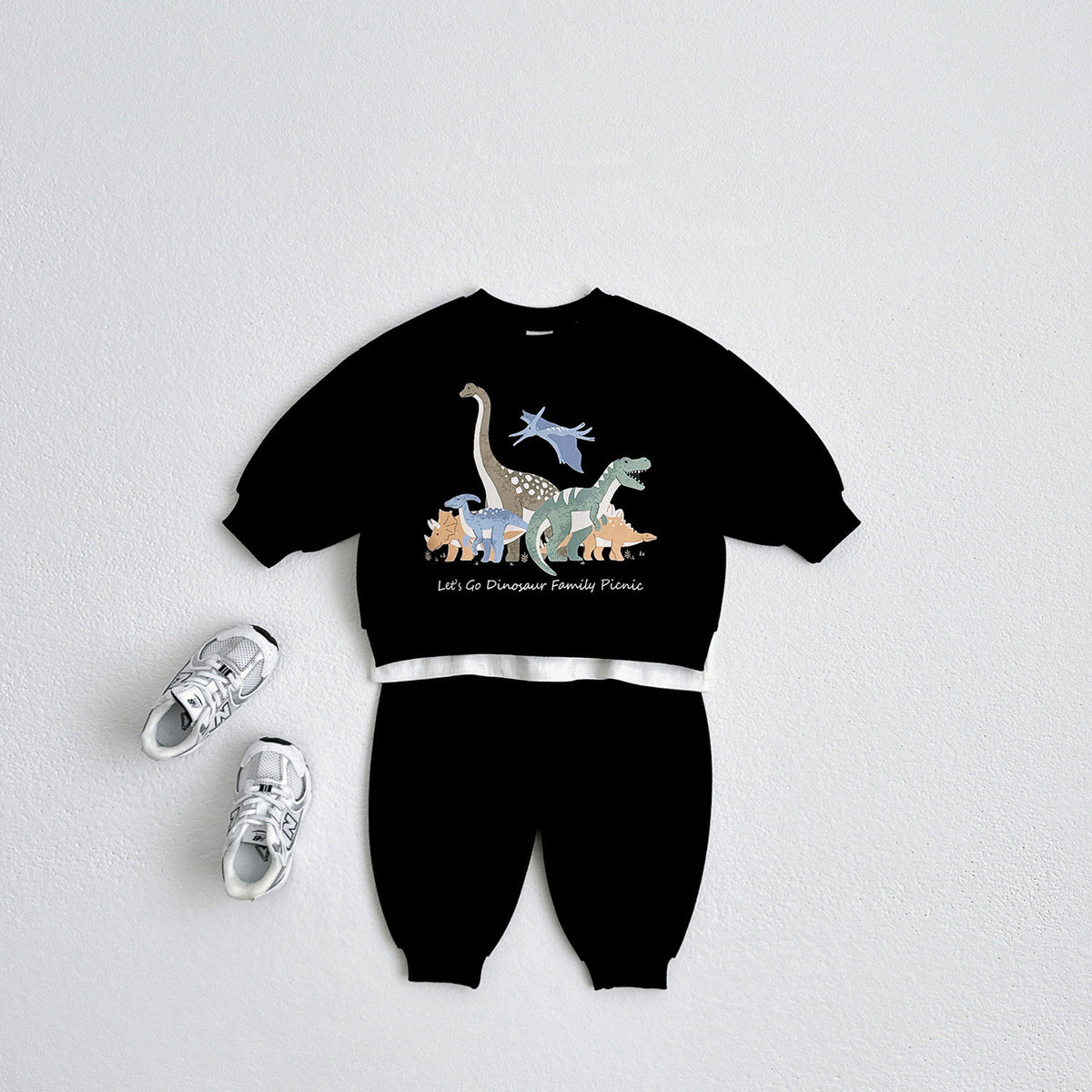 Black dinosaur print sweatshirt and joggers with sneakers