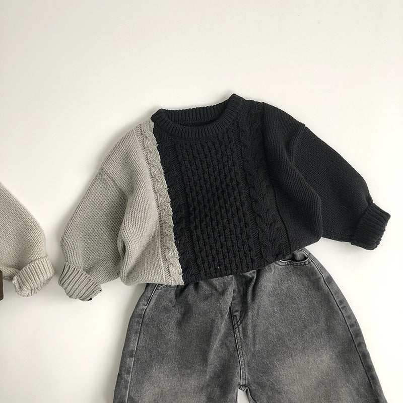 Black and gray colour block cable knit sweater with jeans