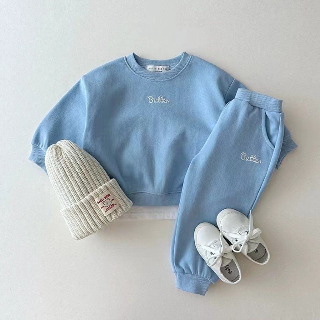 Light blue sweatshirt and joggers set with beanie and sneakers