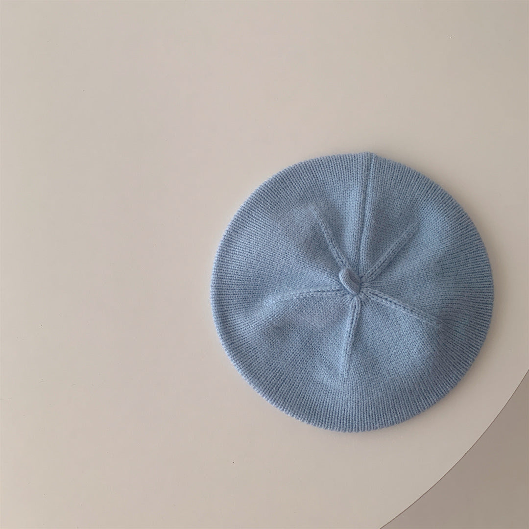Blue knitted baby beret