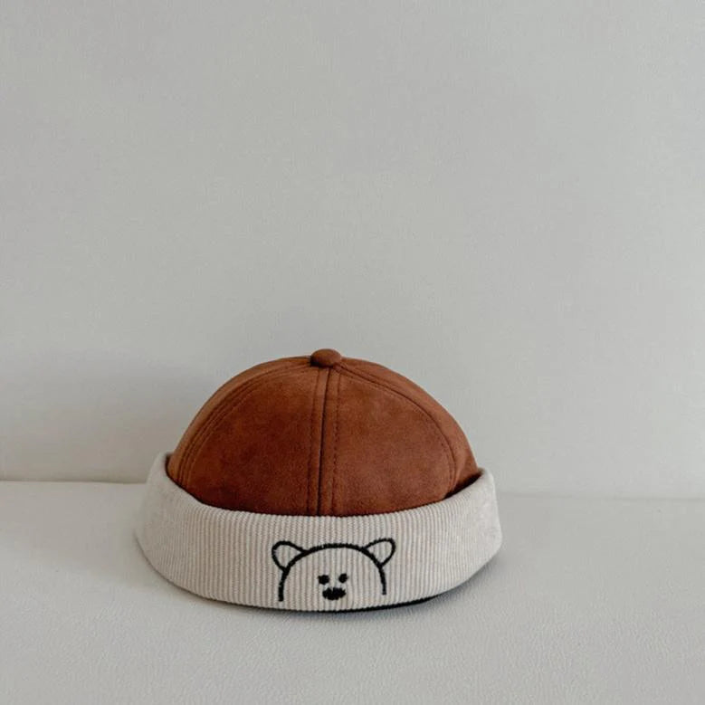 Bronze corduroy toddler hat with cream bear embroidered band