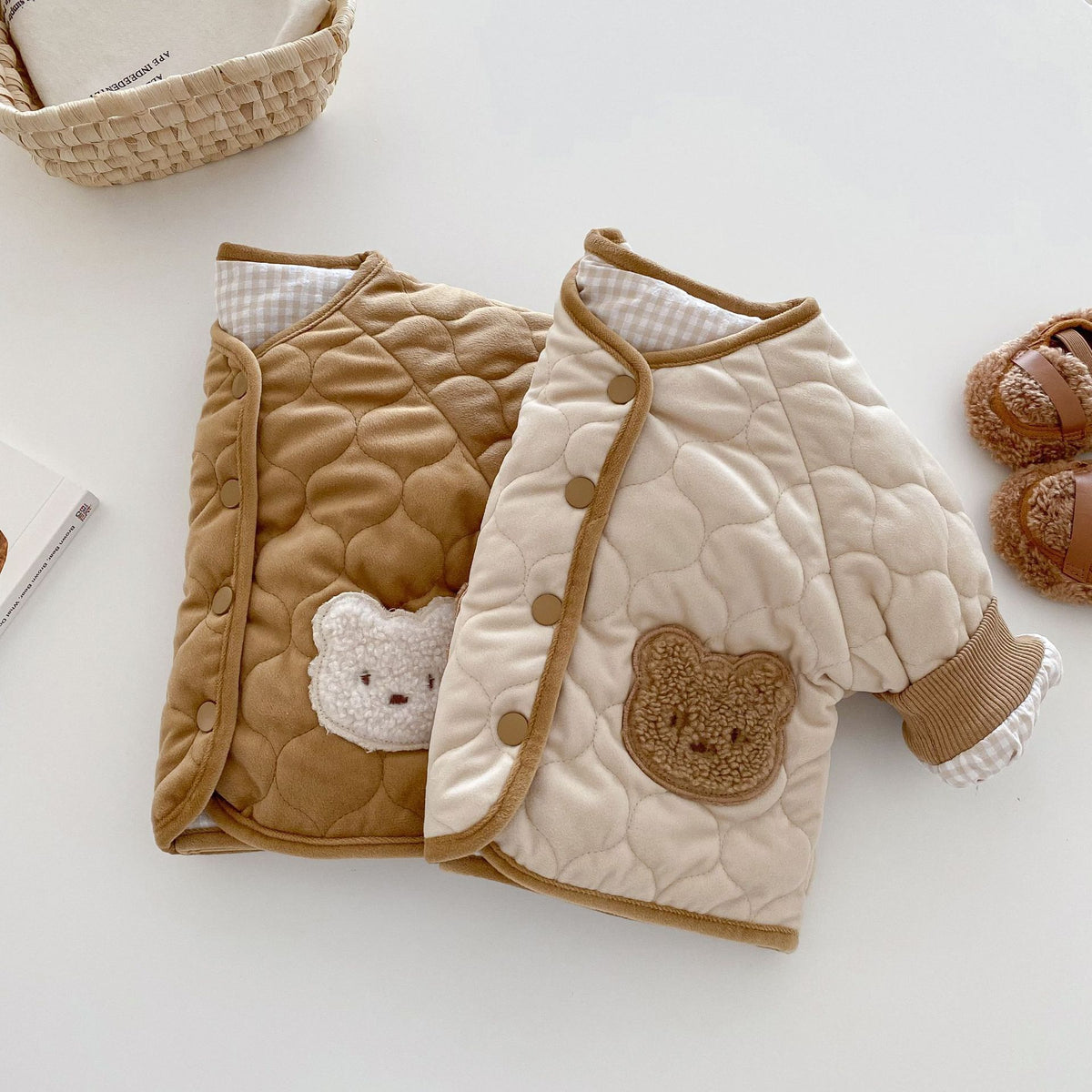 Brown and apricot quilted bear coats layered together