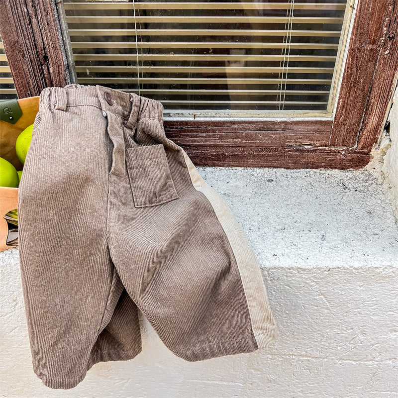 Brown corduroy wide leg pants with cream side stripe