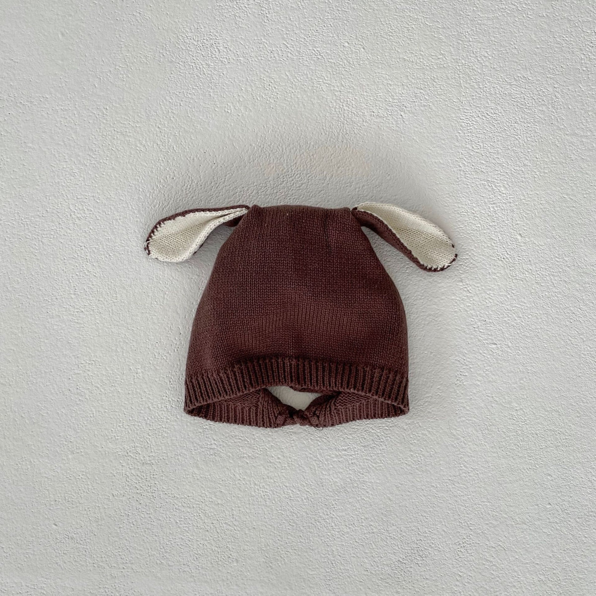 Brown knit baby hat with floppy deer ears, matching hat for the deer romper