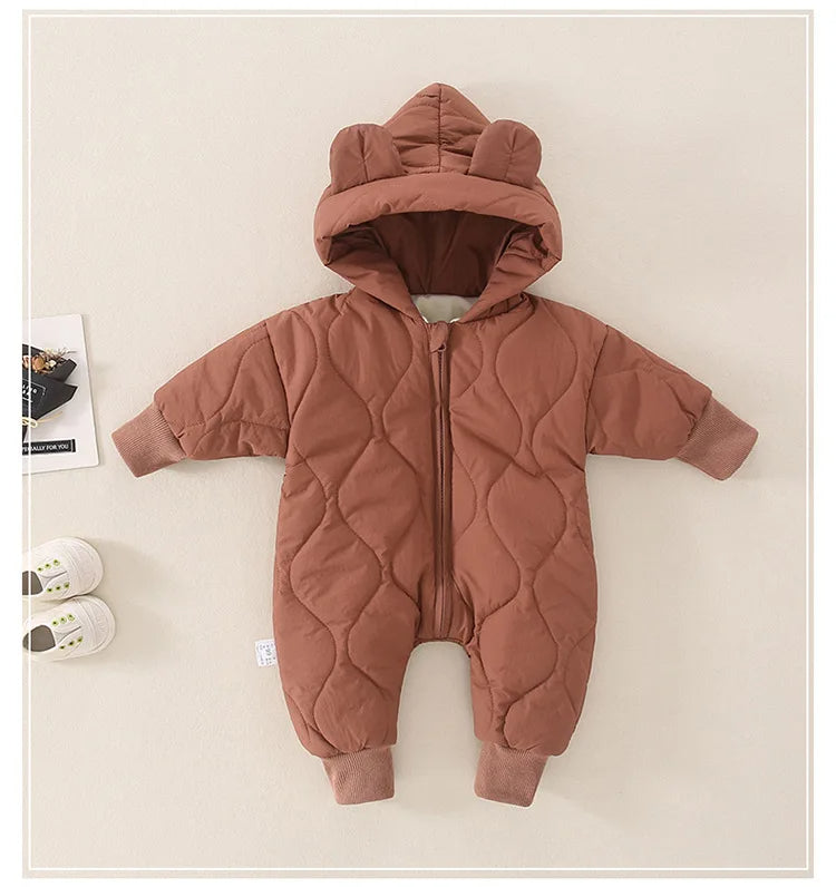 Brown quilted romper with hood up