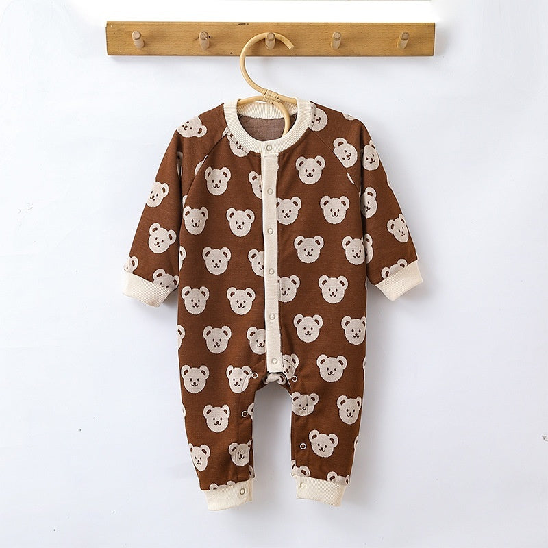 Brown teddy bear knit baby jumpsuit on a hanger