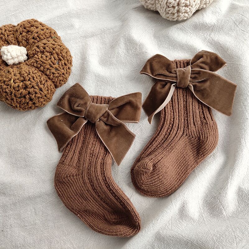 Brown ribbed knit socks with velvet bows