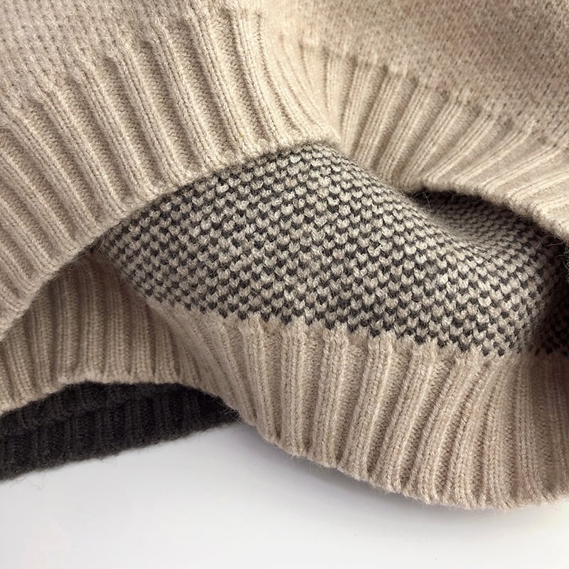 Inside of the sweater showing the neat knitted reverse