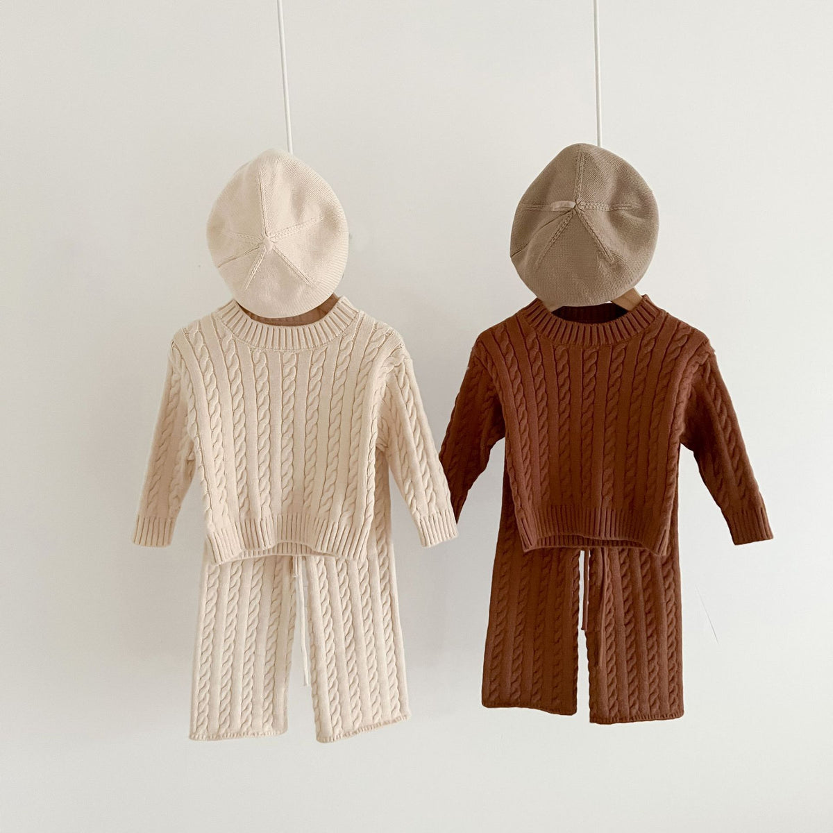 Beige and brown cable knit baby sweater and trouser sets with berets