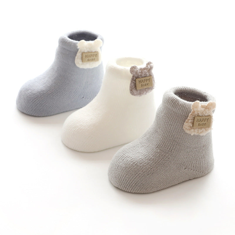 Gray, white and dark gray baby socks with cat tags