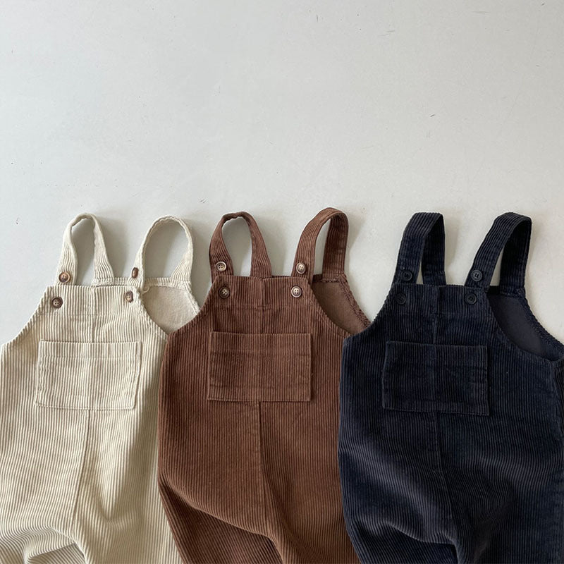 Close-up of three corduroy overalls