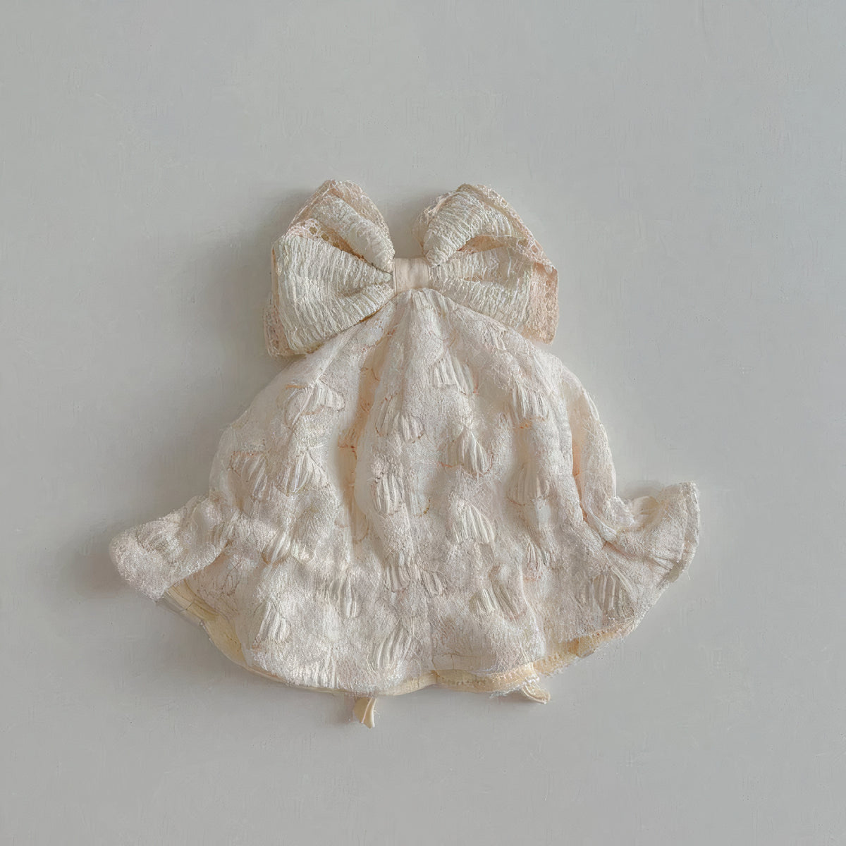 Cream ruffle brim baby sun hat with cream bow