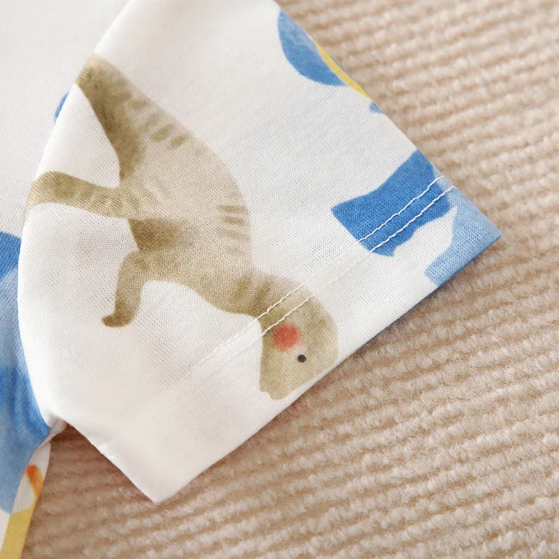 Close-up of sleeve on dinosaur romper