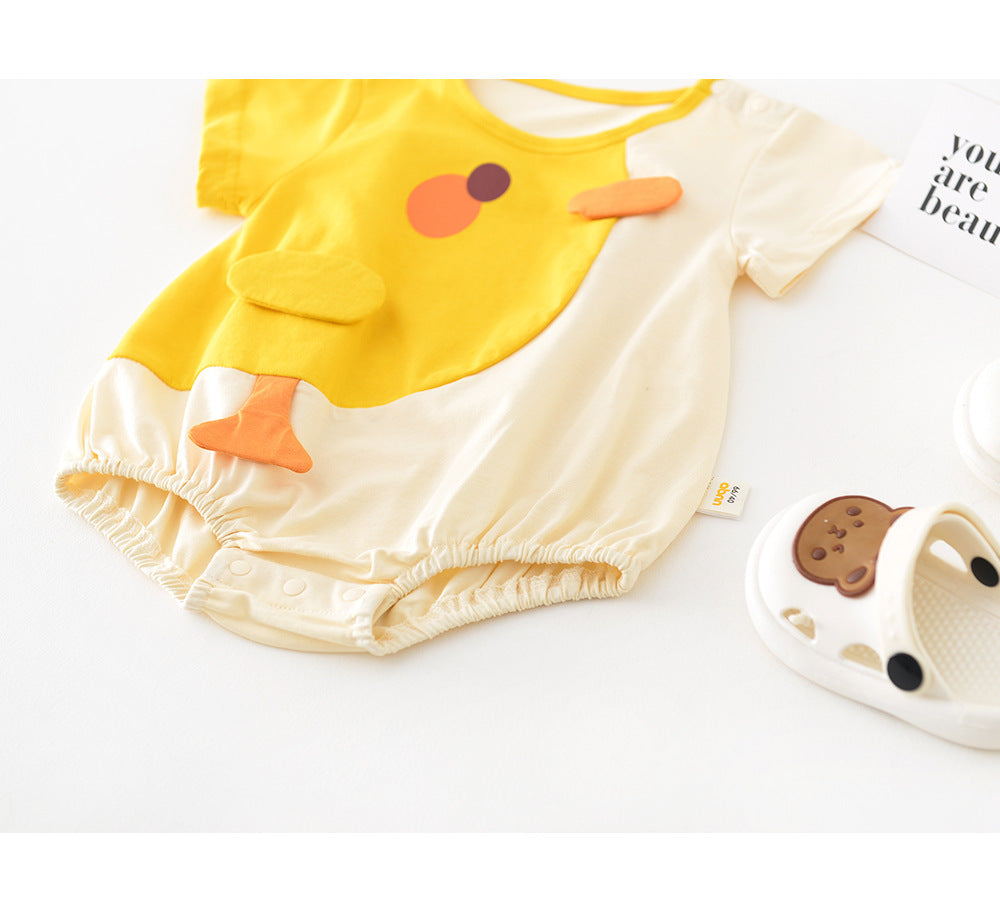 Yellow duck baby romper laid flat with toy