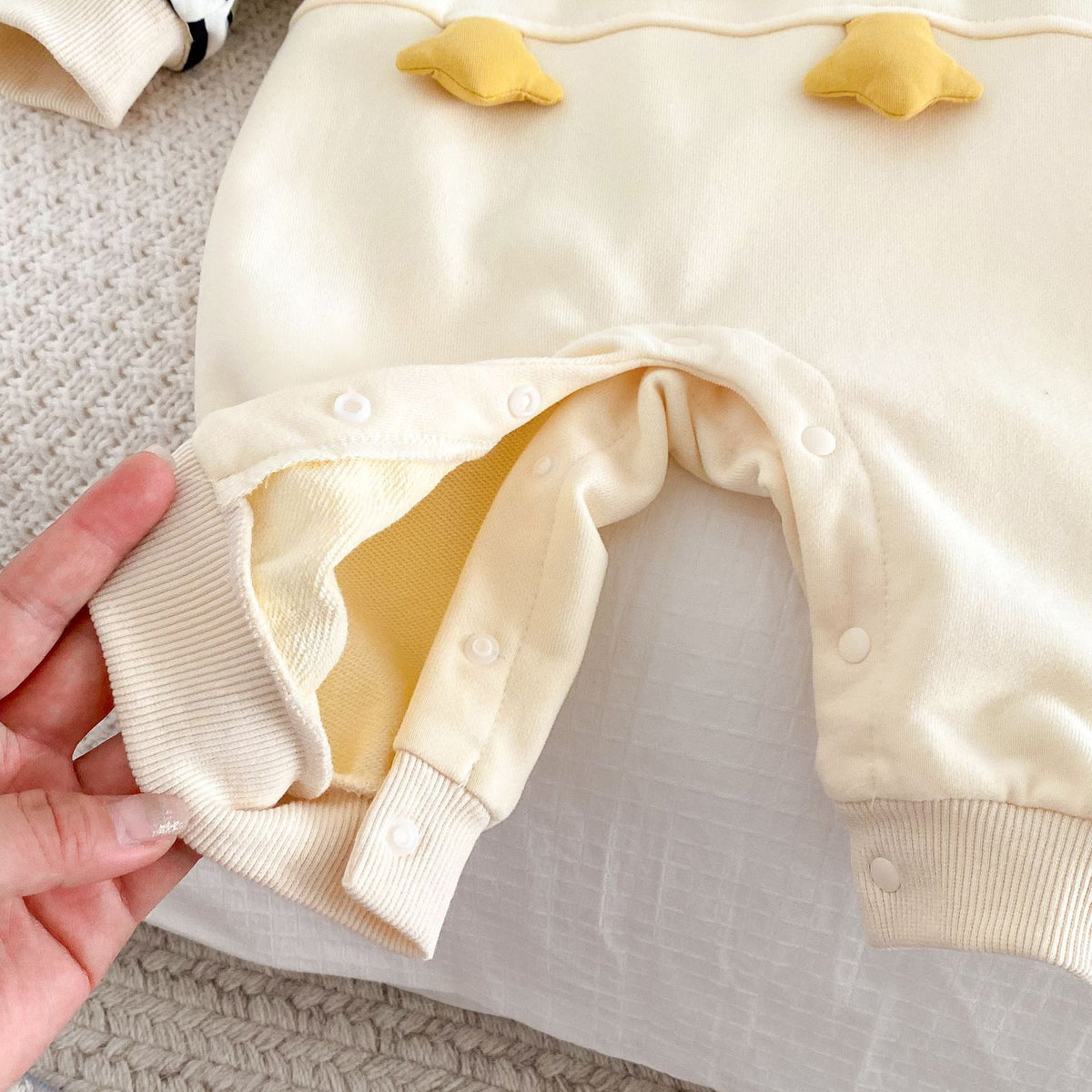 Close-up of leg snaps on duck romper