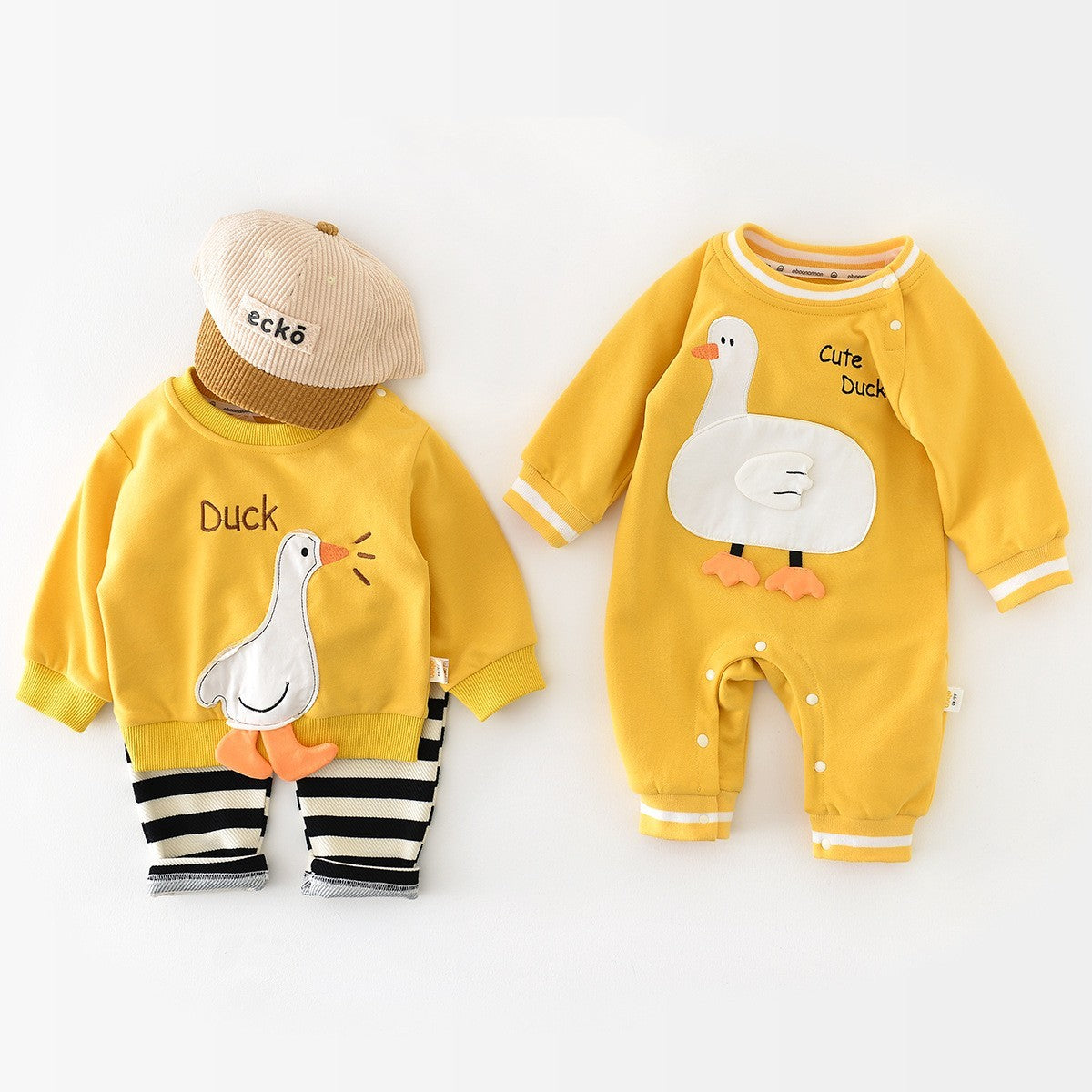 Yellow duck sweatshirt and baby bodysuit side by side