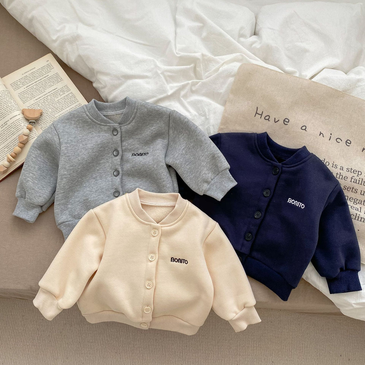 Gray, navy and beige fleece-lined baby jackets