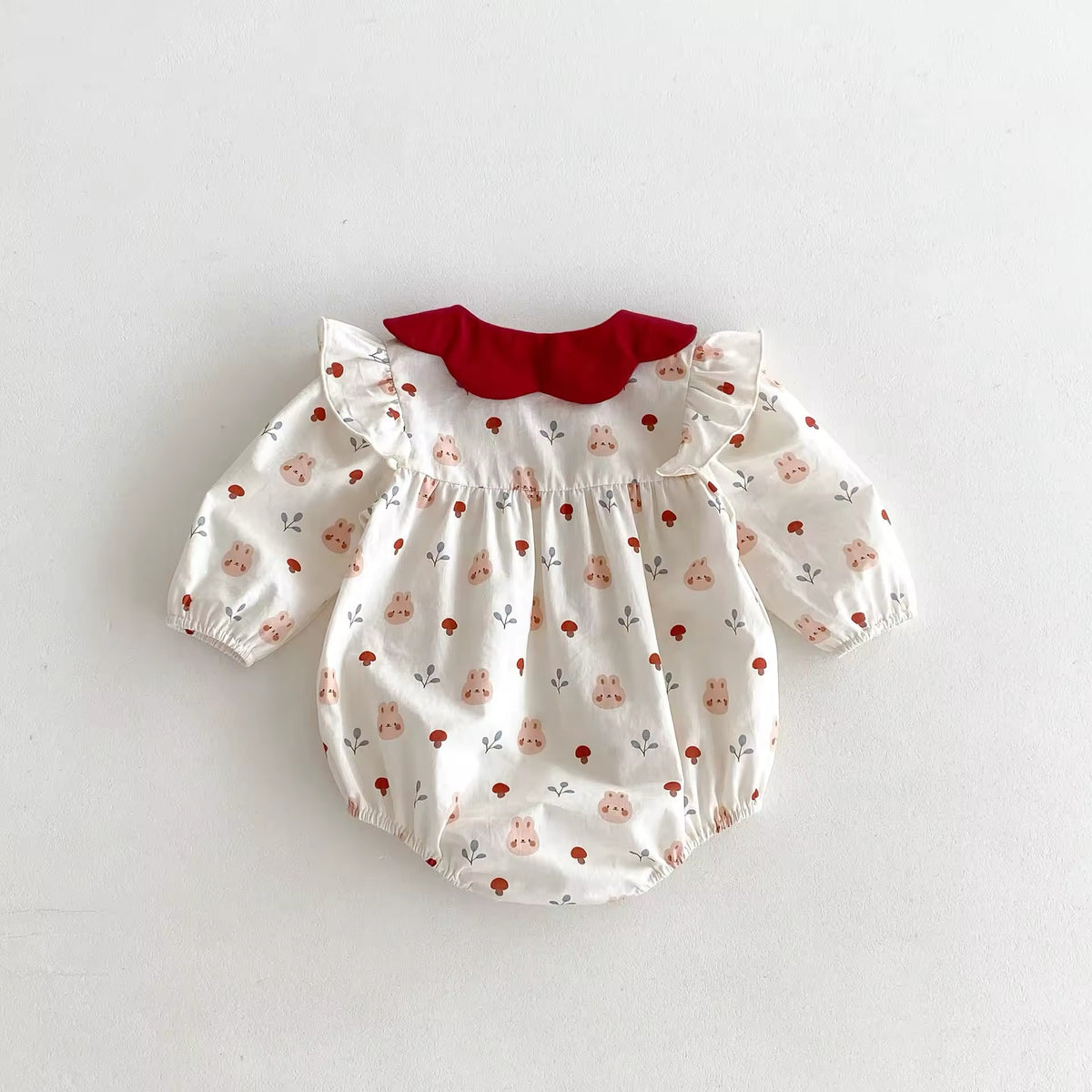 Cream floral cotton baby romper with puff sleeves