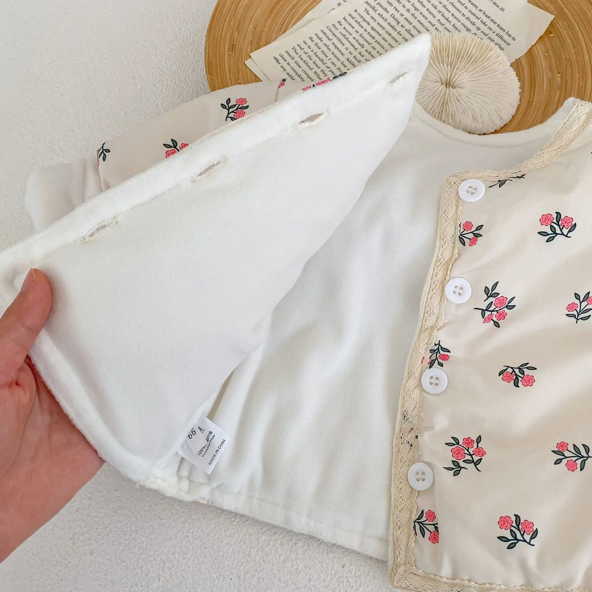 Floral jacket opened to show fleece lining