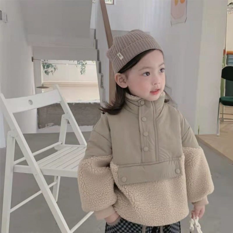 Girl wearing fleece colour block pullover with beanie