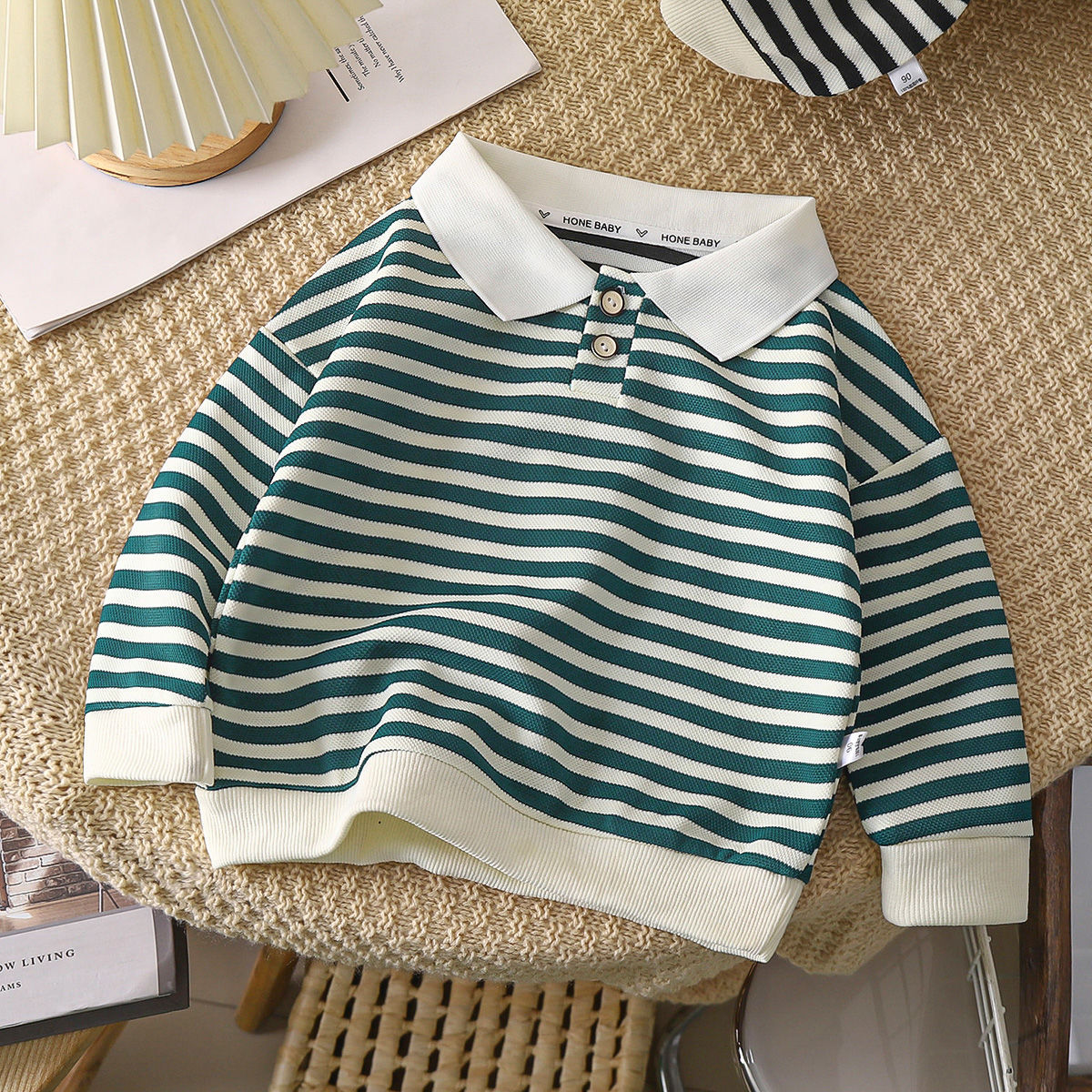 Green and white striped polo collar sweatshirt