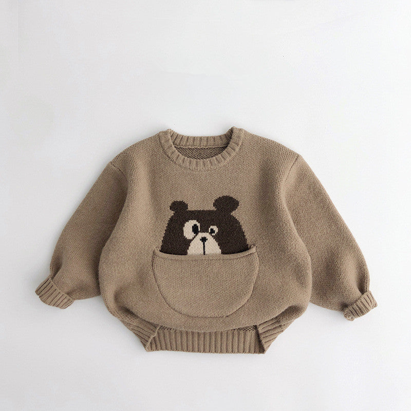 Khaki knit sweater with bear peeking from pocket