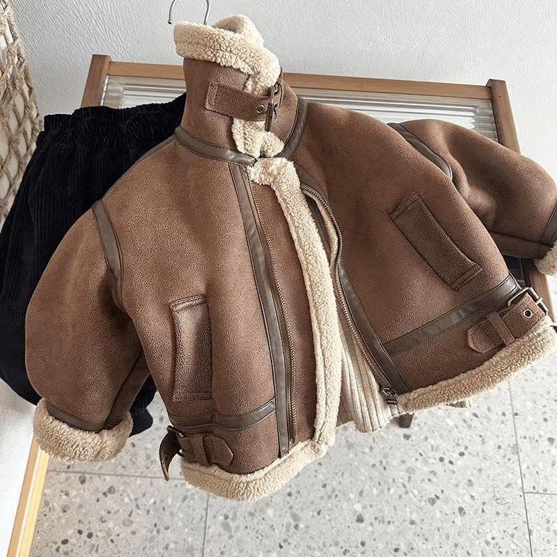 Kids brown faux suede aviator jacket on a chair