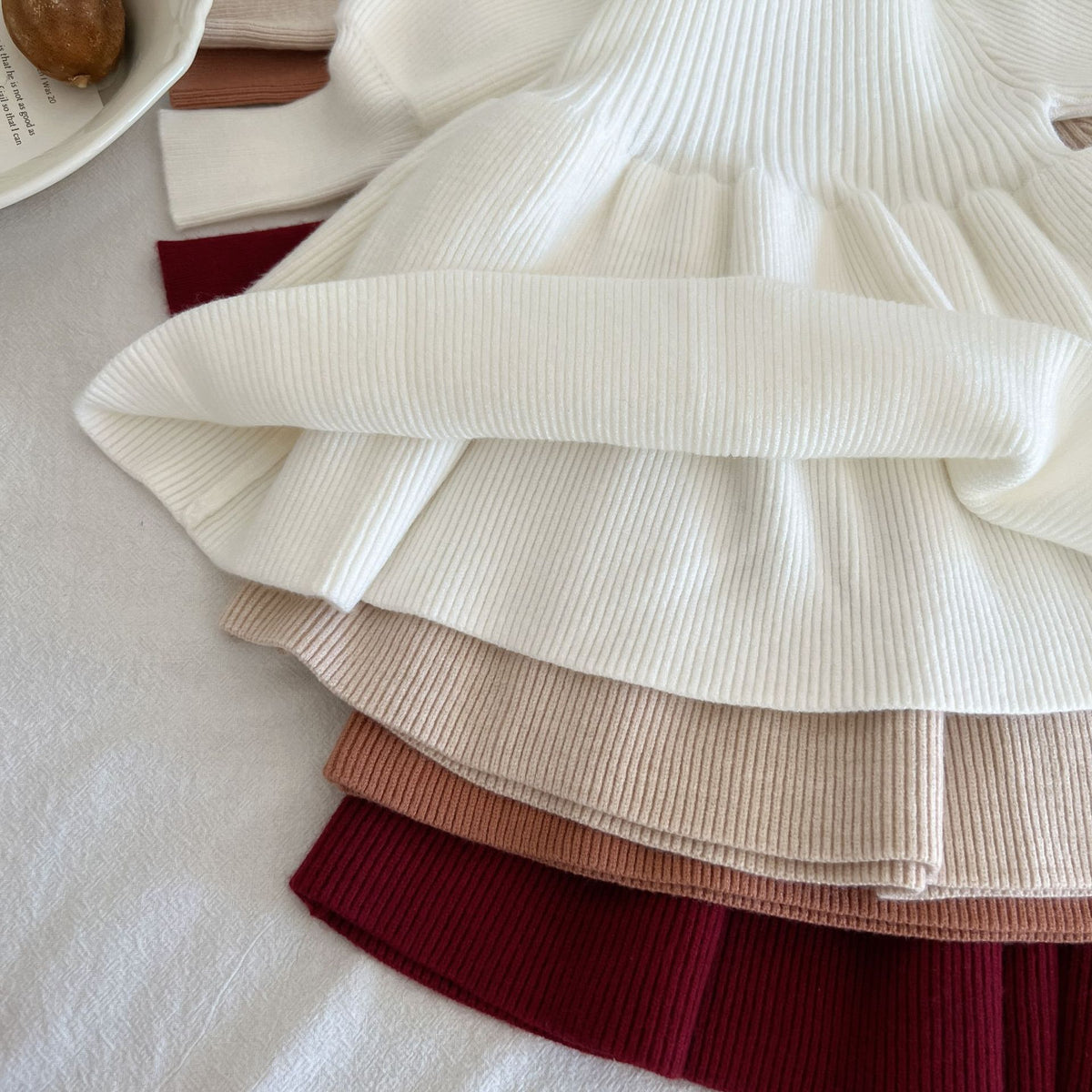 Layered skater skirts of knit dresses