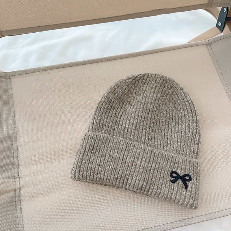 Mocha ribbed knit beanie with black bow