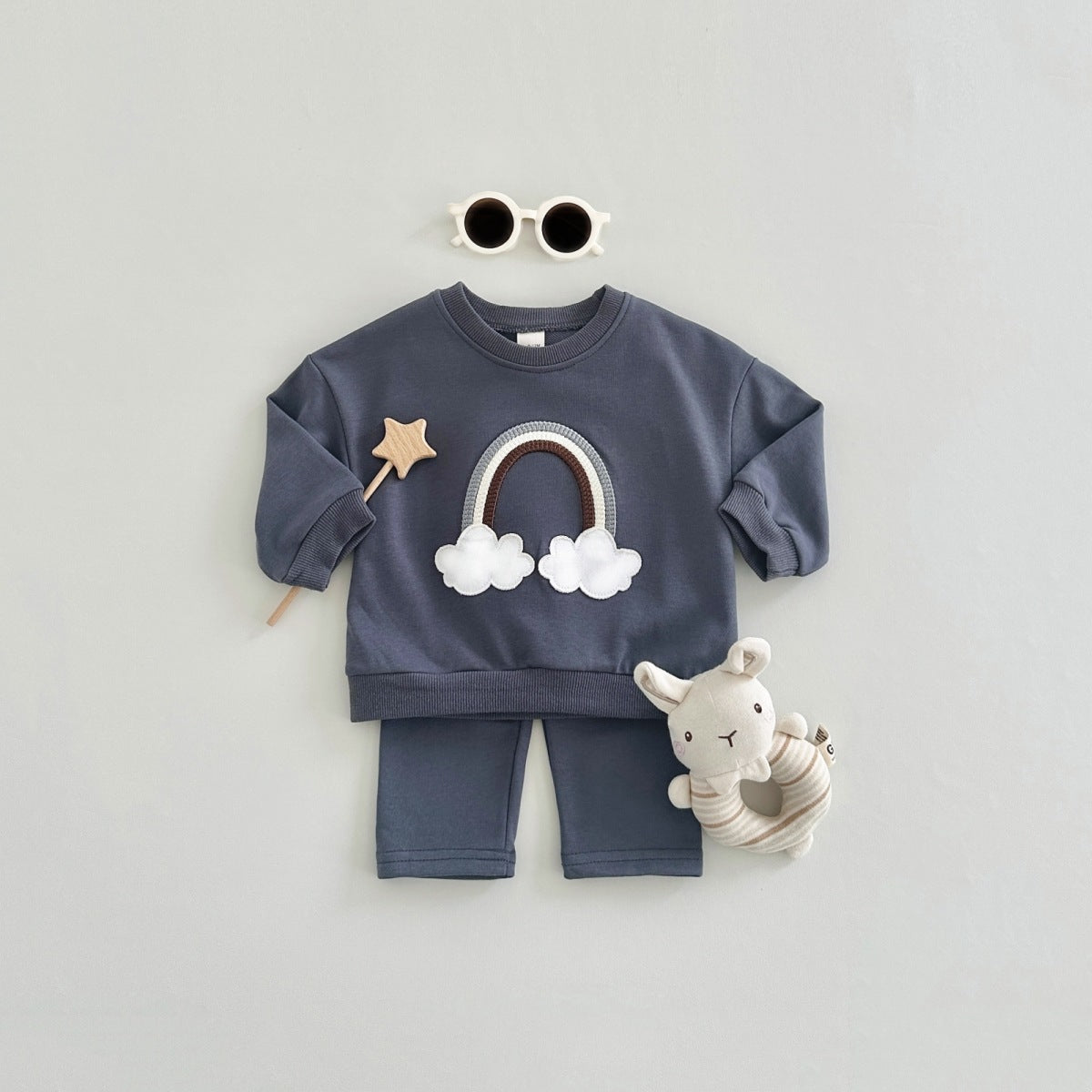 Navy rainbow cloud sweatshirt and pants with toys