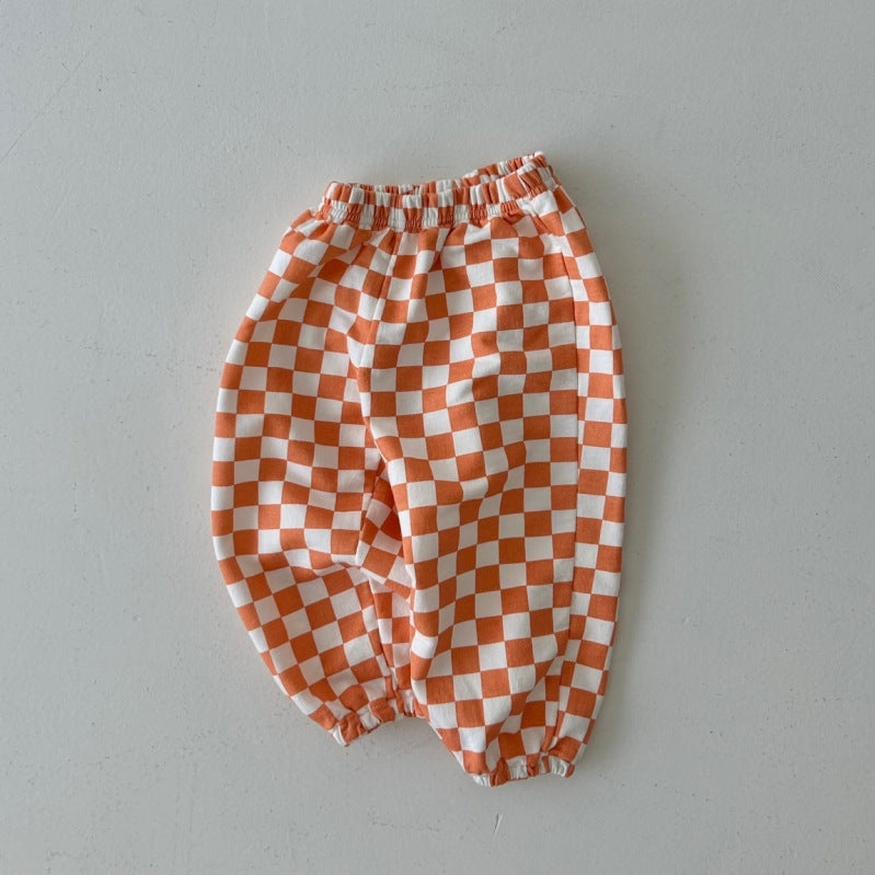 Orange checkerboard jogger pants