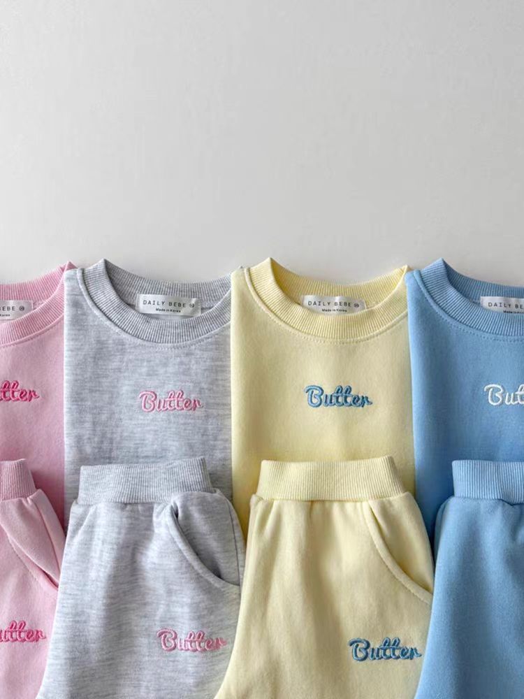 Pastel sweatshirt and jogger sets in pink, gray, yellow and blue