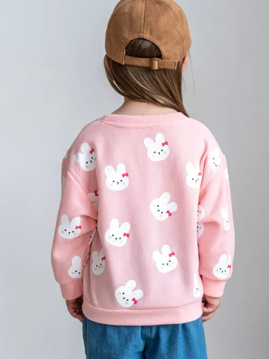 Back view of pink bunny print top