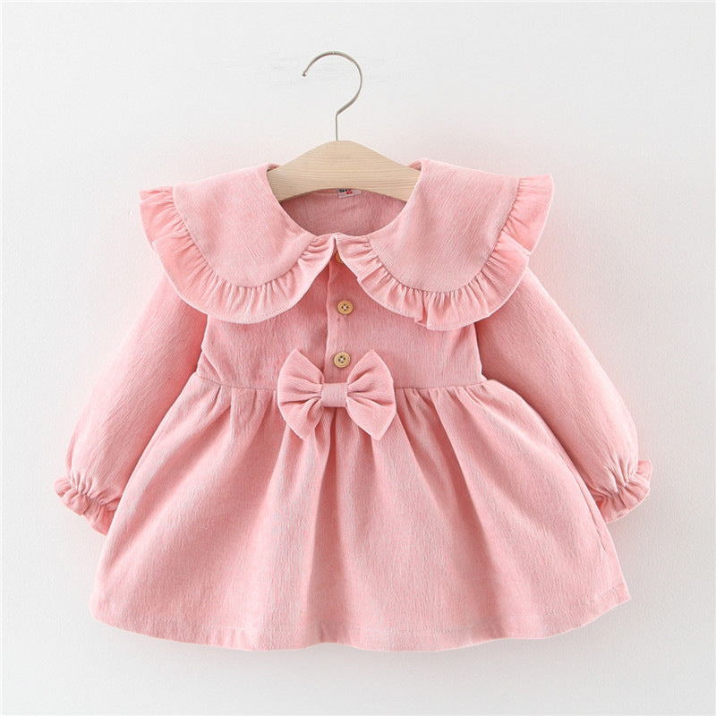 Pink corduroy princess dress with ruffle collar and bow