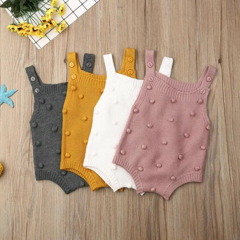 Grey, orange, white and pink pom-pom knit baby rompers