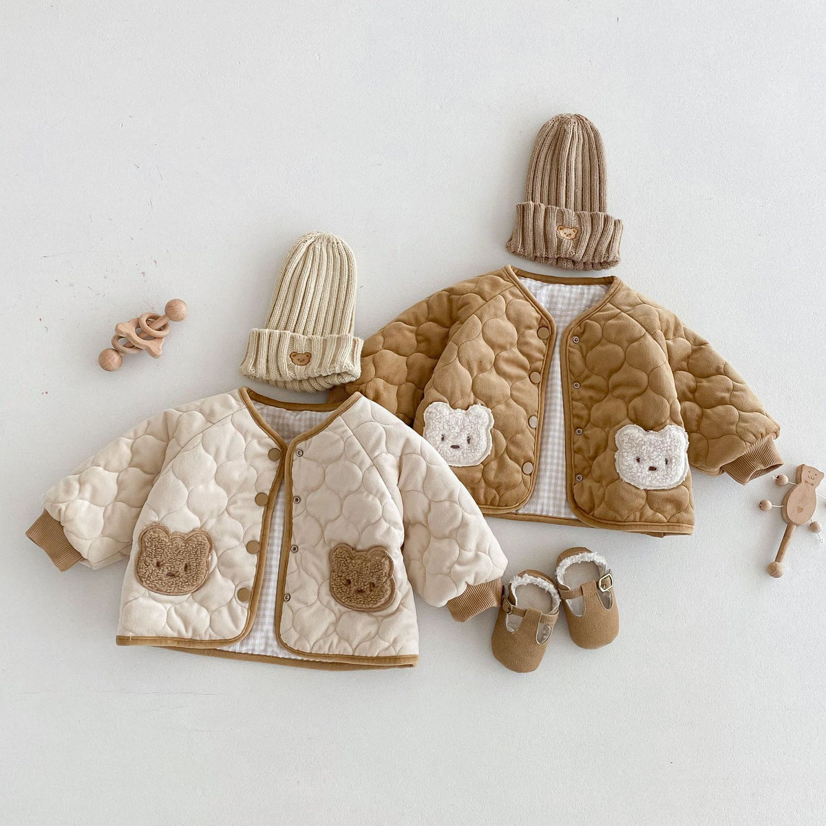 Apricot and brown quilted bear pocket baby coats styled with knit beanies