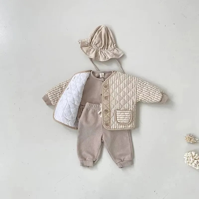 Quilted baby coat with hat styled with pants