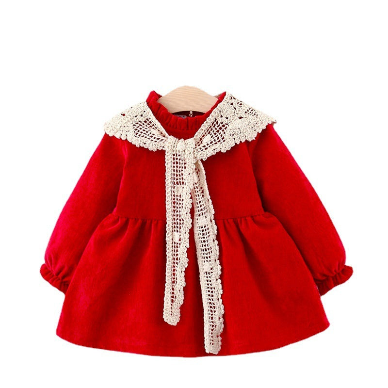 Red Christmas dress with lace collar on white background