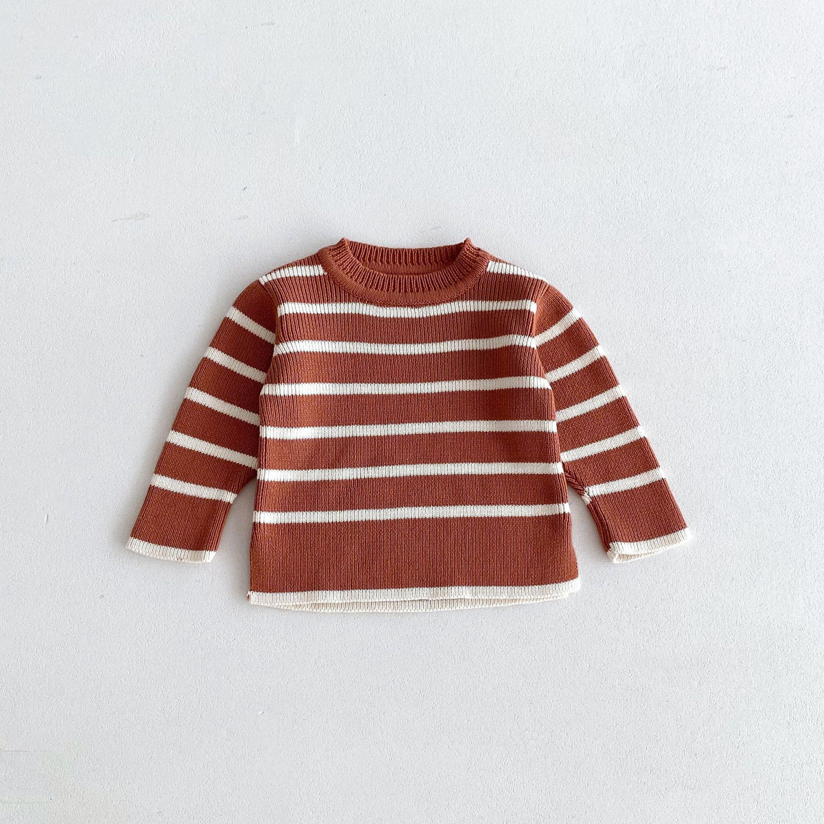 Rust and cream striped knit toddler sweater