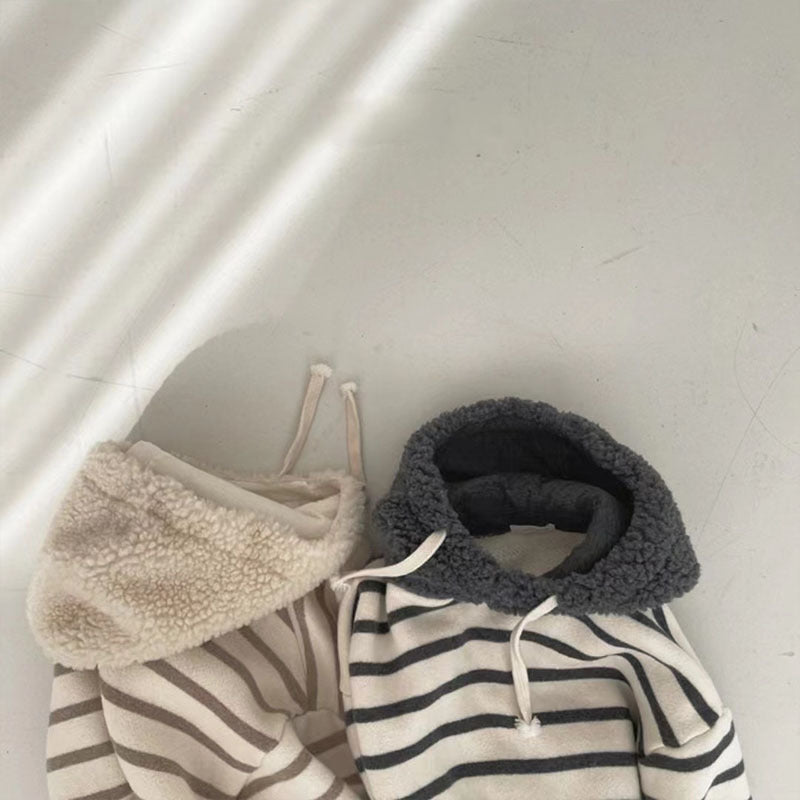 Close-up of sherpa-lined hoods on striped hoodies